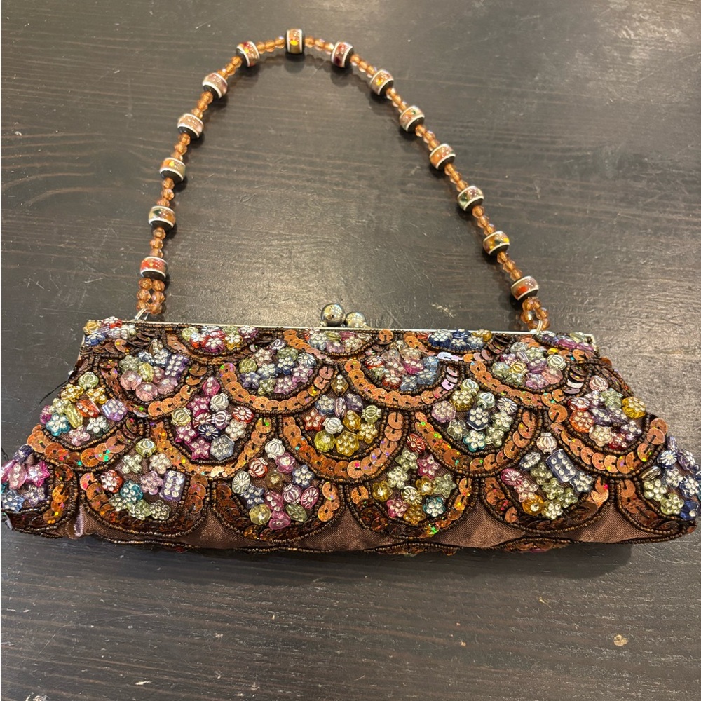 Vintage beaded bag . Brown/ amber tones. Also has silver chain. $45.